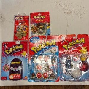 Vintage Collection of five POKE’MON Sealed Pkg. Collectibles